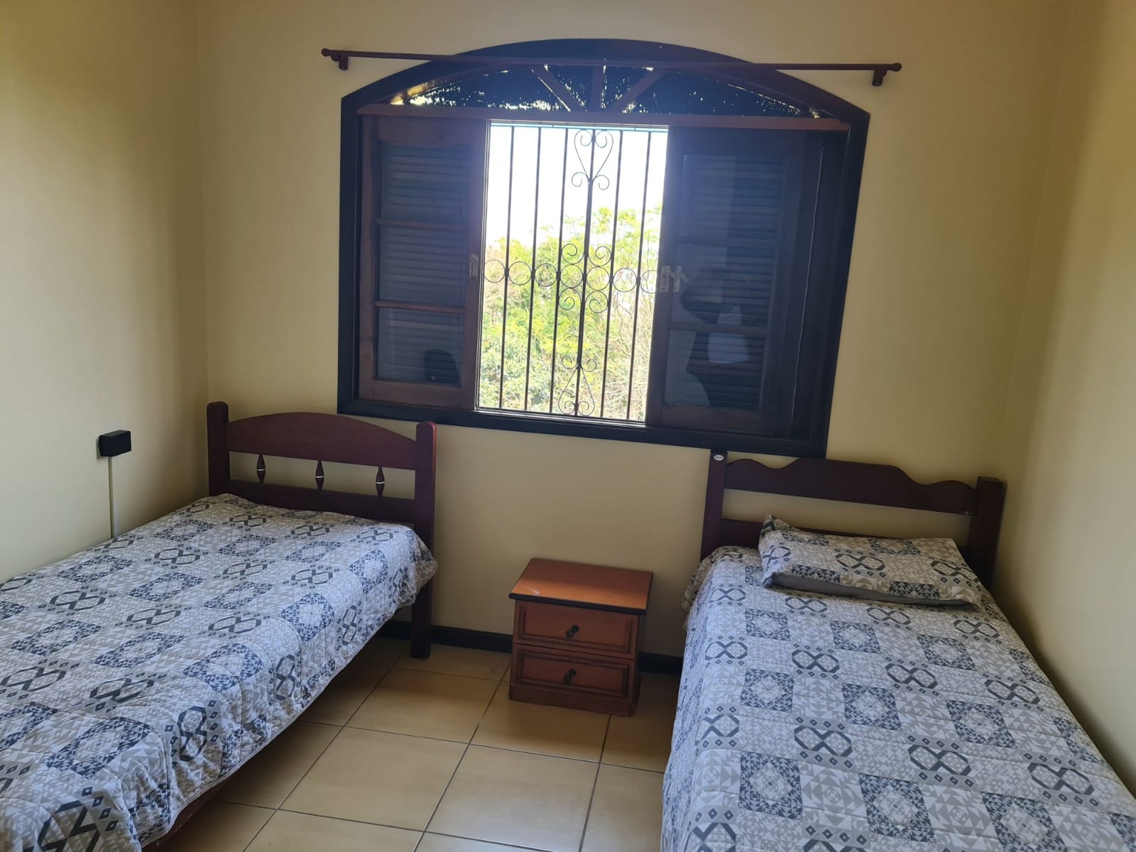 Quarto com duas camas no Recanto Nova Canaã